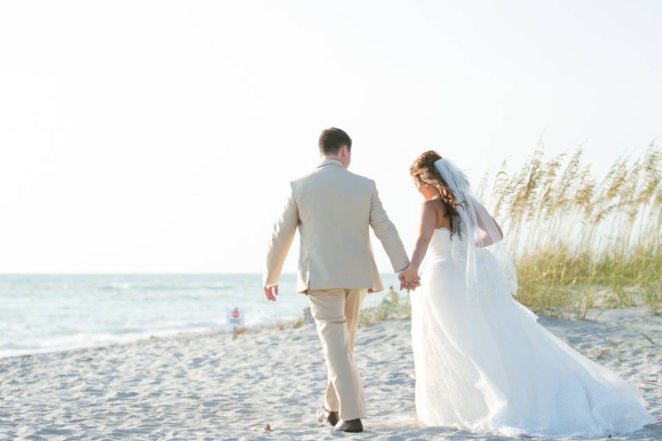 Couple leisurely walk hand in hand