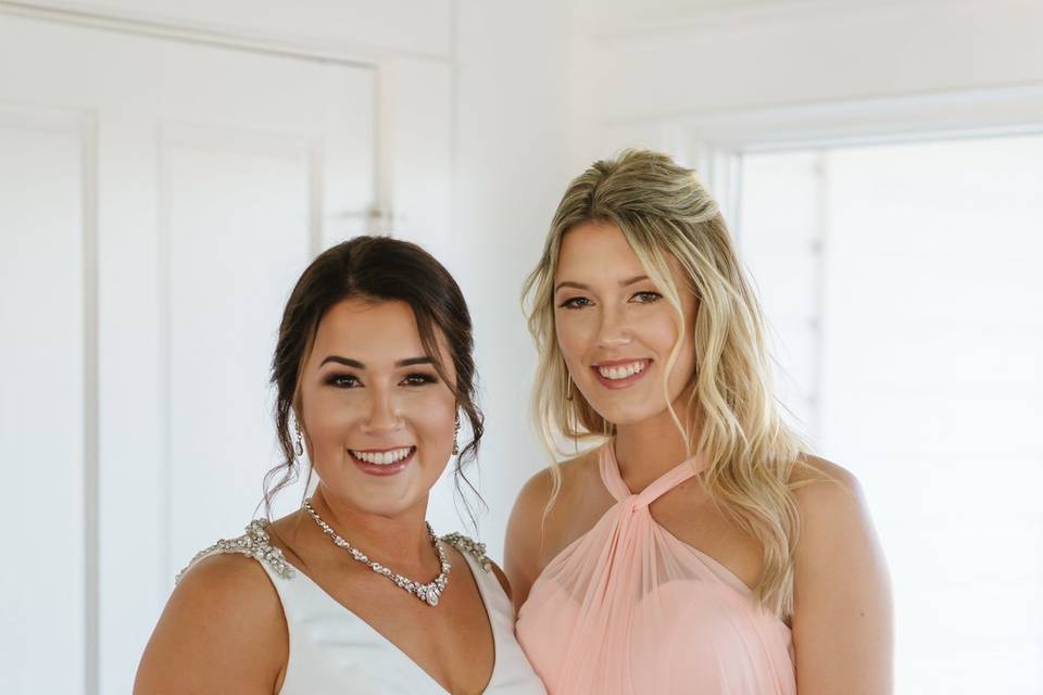 Bride and bridesmaid