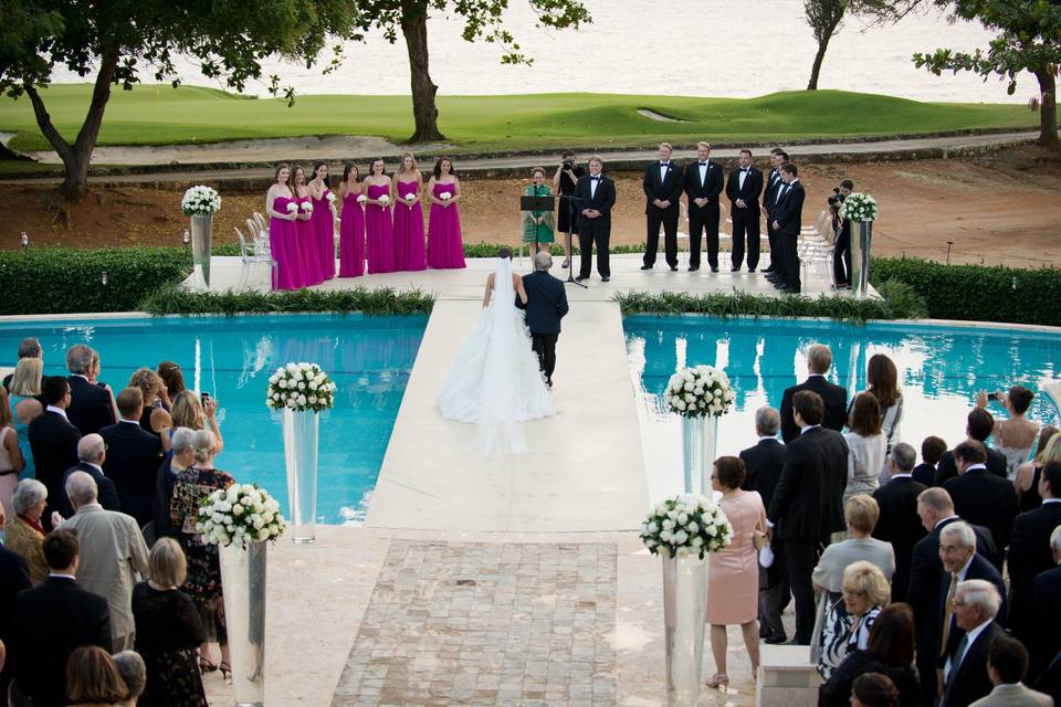 Wedding ceremony over pool