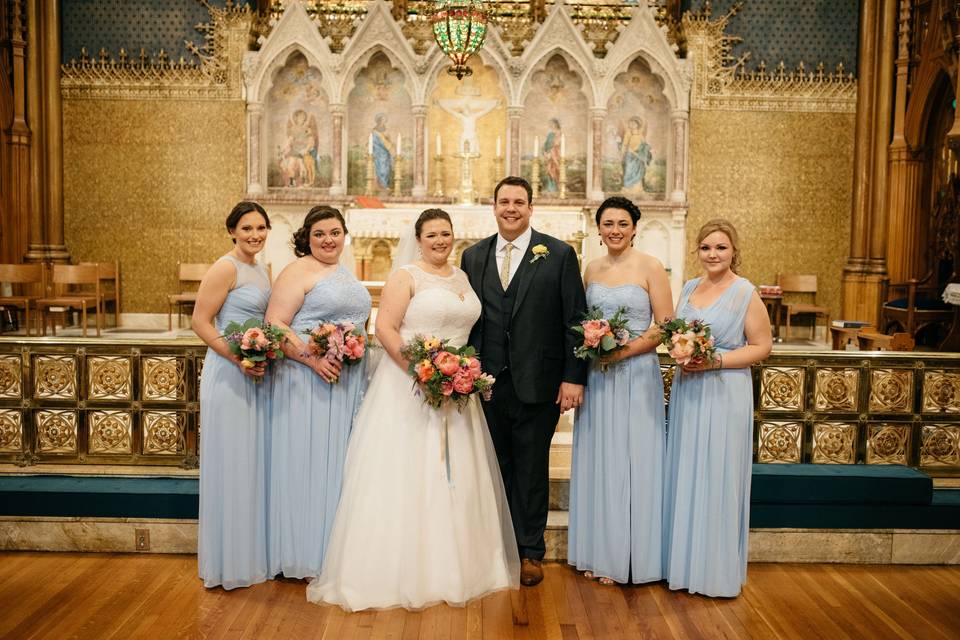 Couple with the bridesmaids