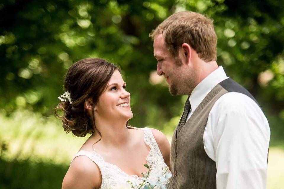 Bride and groom looking into each other's eyes