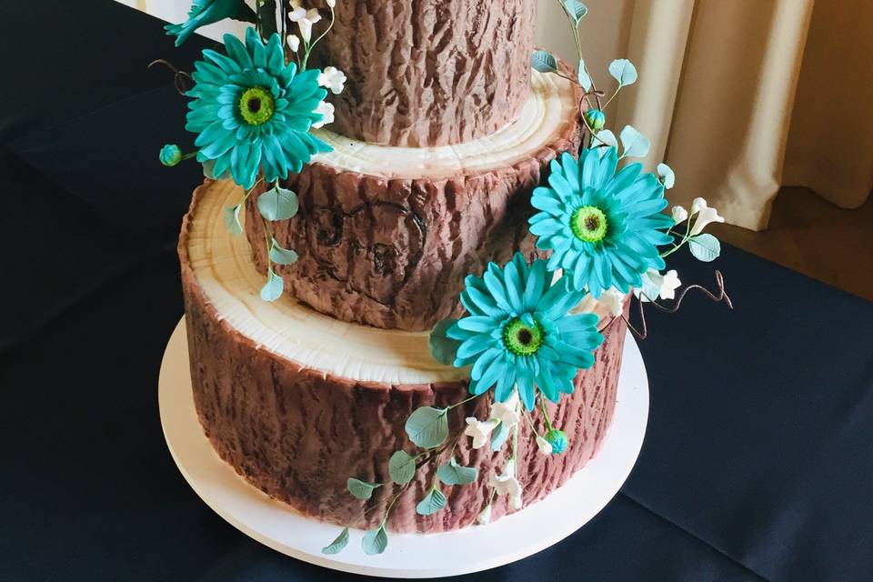 Rustic tree log with Gerberas