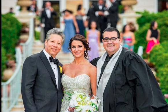 Newlyweds and the officiant