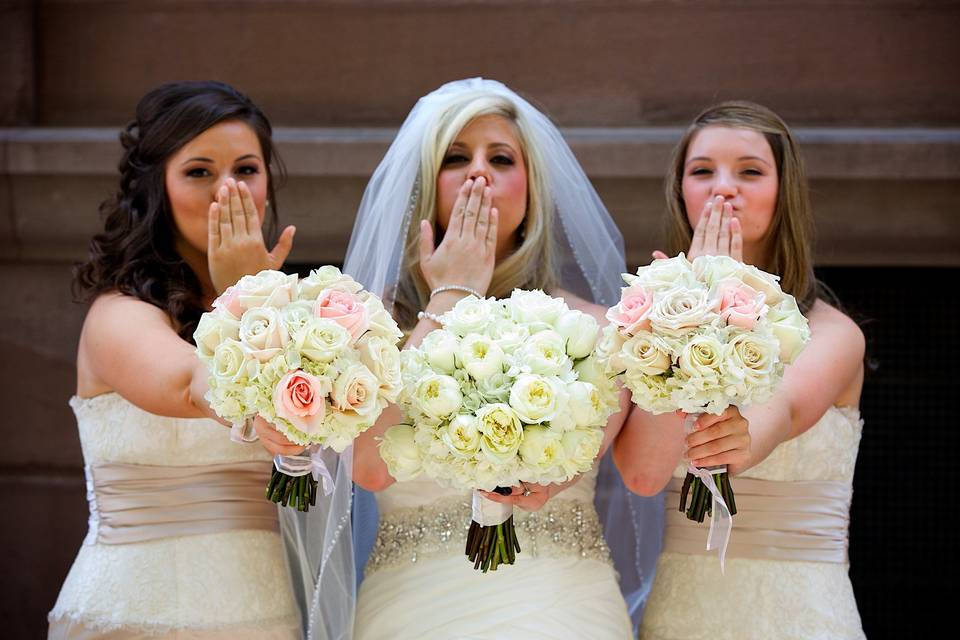Bride, bridesmaids, and flower girl