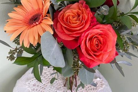 Soft orange attendant bouquet