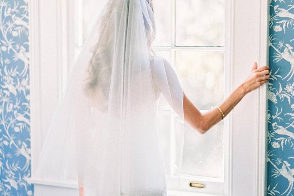 Bride beside the window