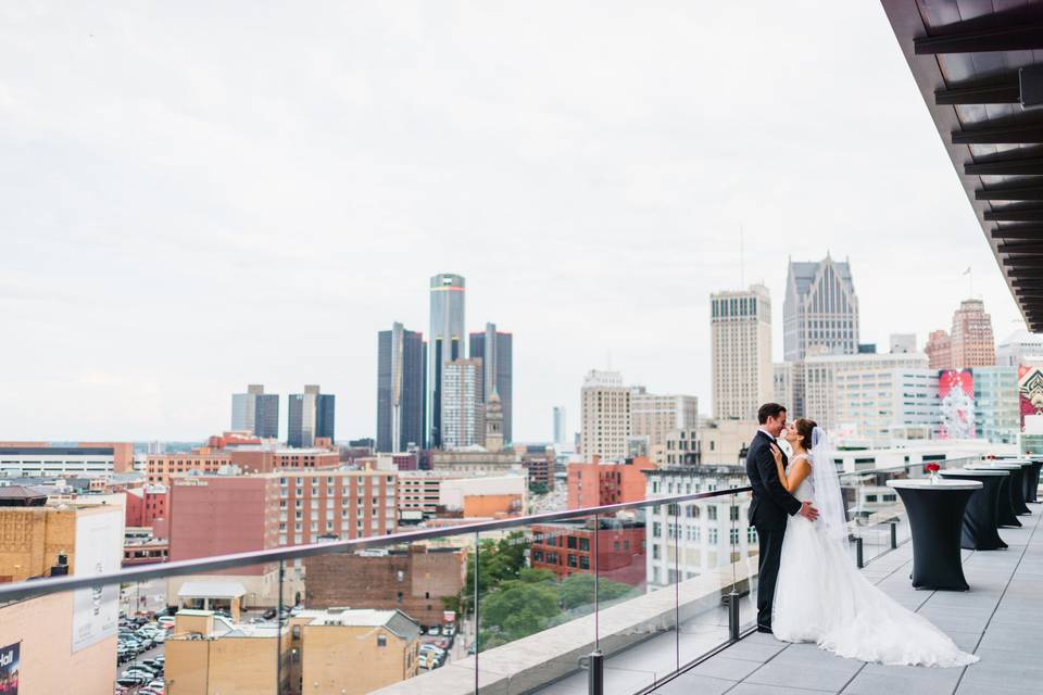 A smiling wedding party