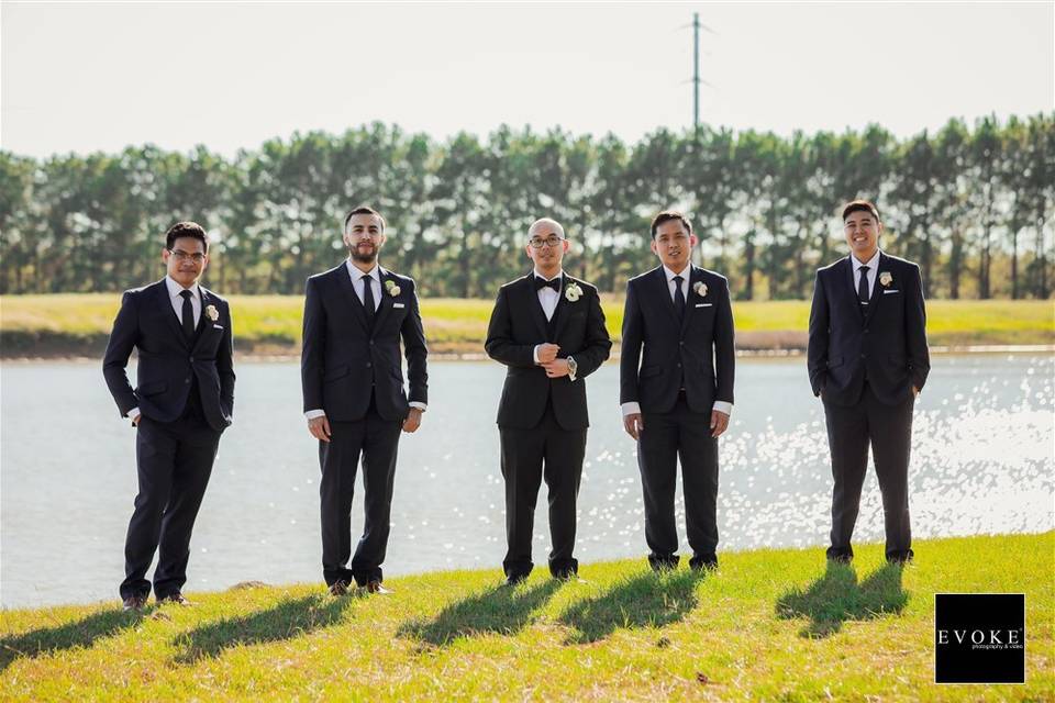 Handsome groomsmen at the lake