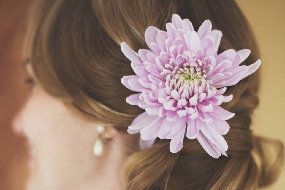 Wedding updo with flower