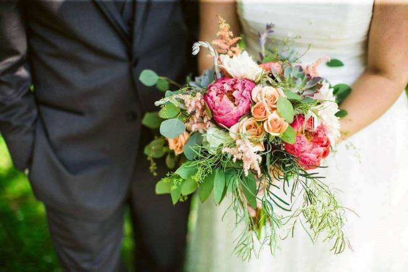 Newlyweds and bouquet