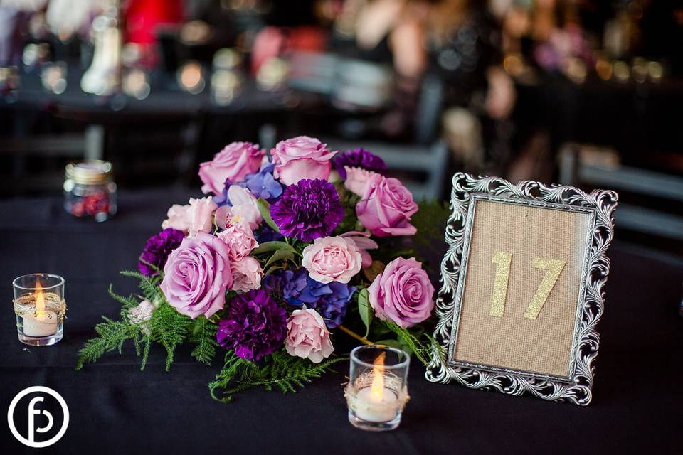 Pink and purple table centerpiece