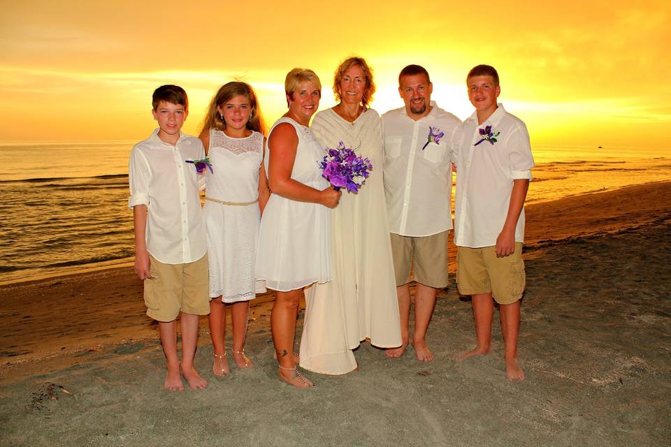 Officiant with the newlyweds' family
