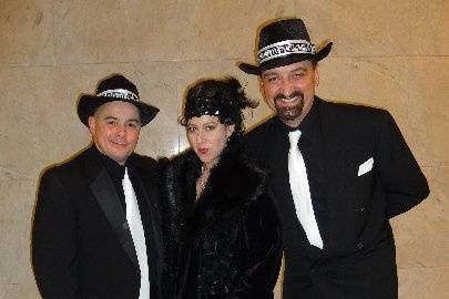 Diane Martinson Jazz Trio (vocal, piano drums), dressed for playing 1920's & 30's music at an 