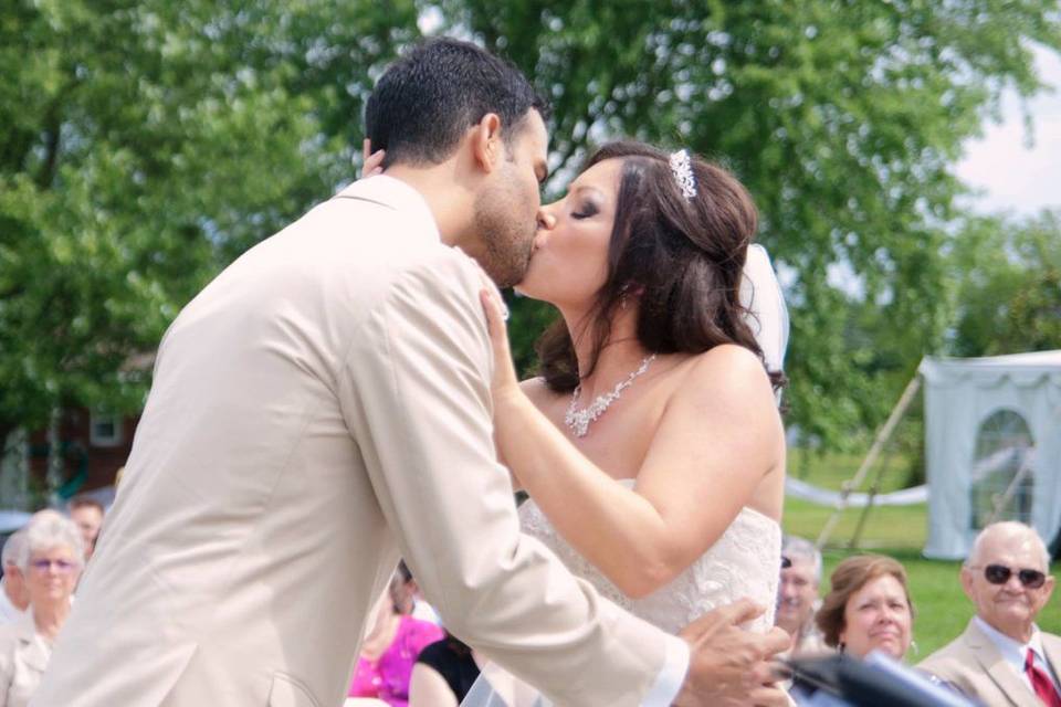 Bride and groom kiss