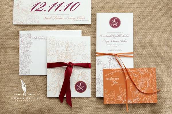 French wood cut floral design graces this invitation suite. Offset printing on 100% cotton