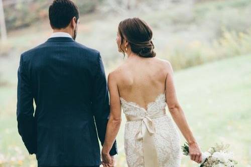 Couple holding hands