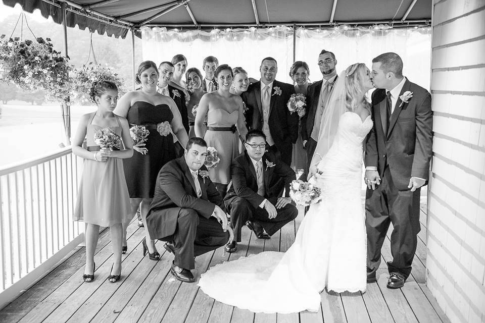 Couple with their bridal attendants