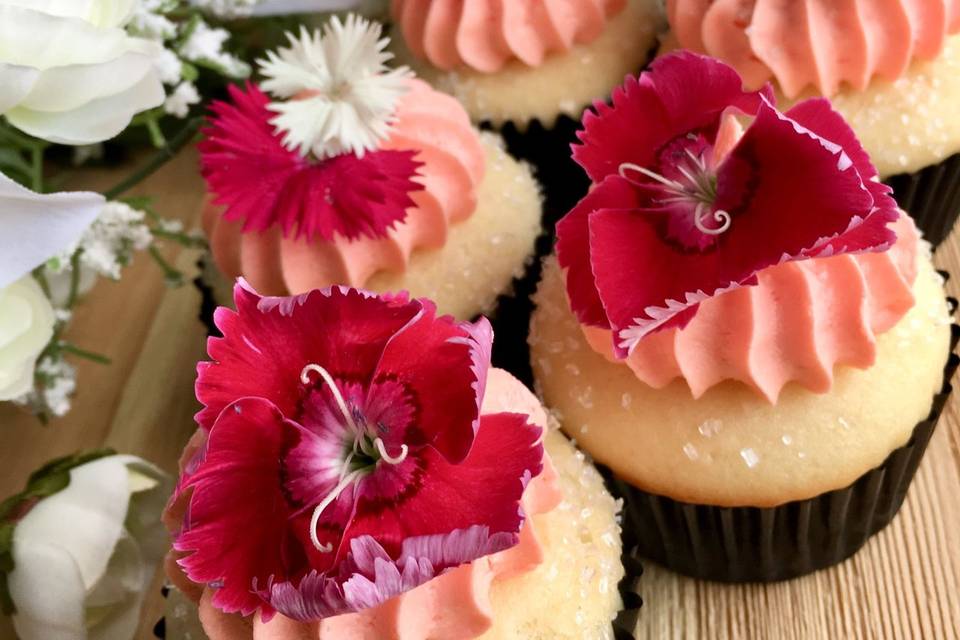 Champagne Kisses cupcakes for a bridal shower with edible flowers