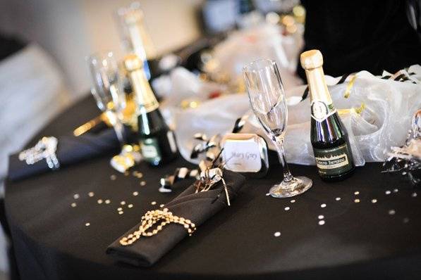 Banquet table setting for a black and white themed event.