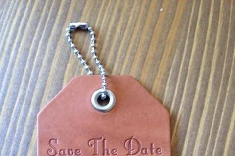 Custom stamped save the dates in raw leather, they can easily be dyed.