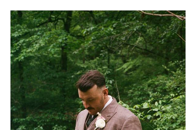 Groom reading his vows