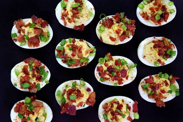 Egg and bacon tidbits topped with onion chives
