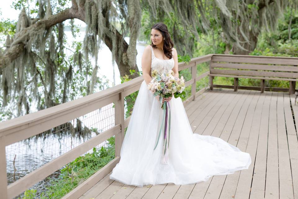 Bride looks to the water