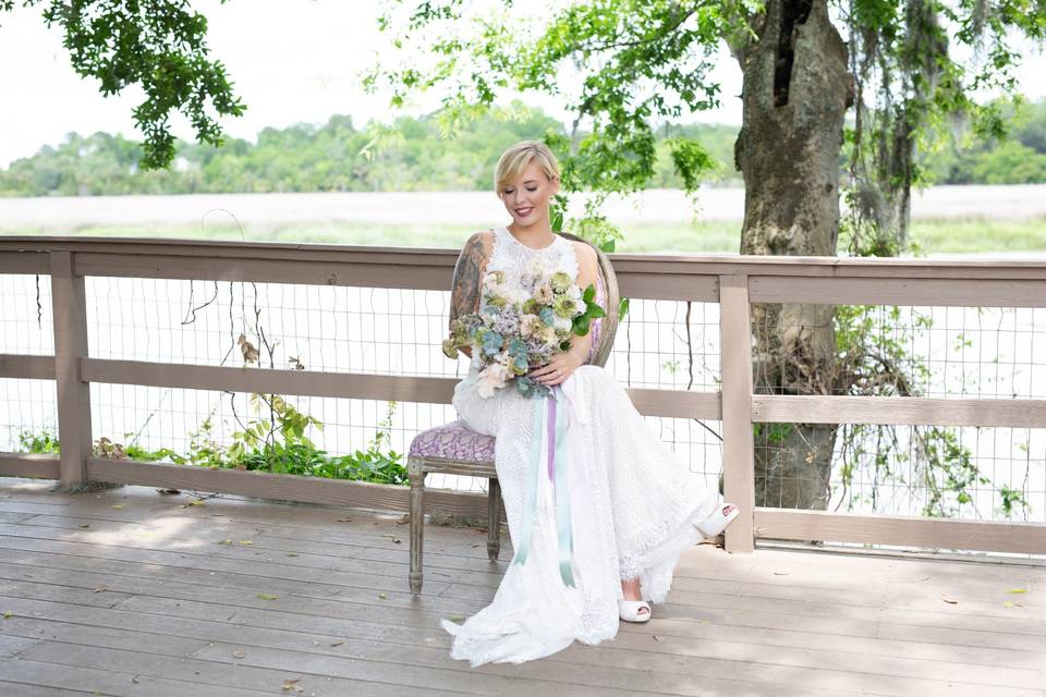 Bride sits on deck