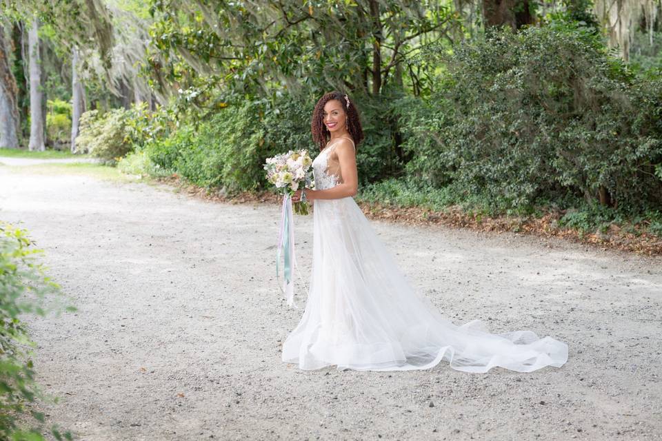 Bride poses on gravel road