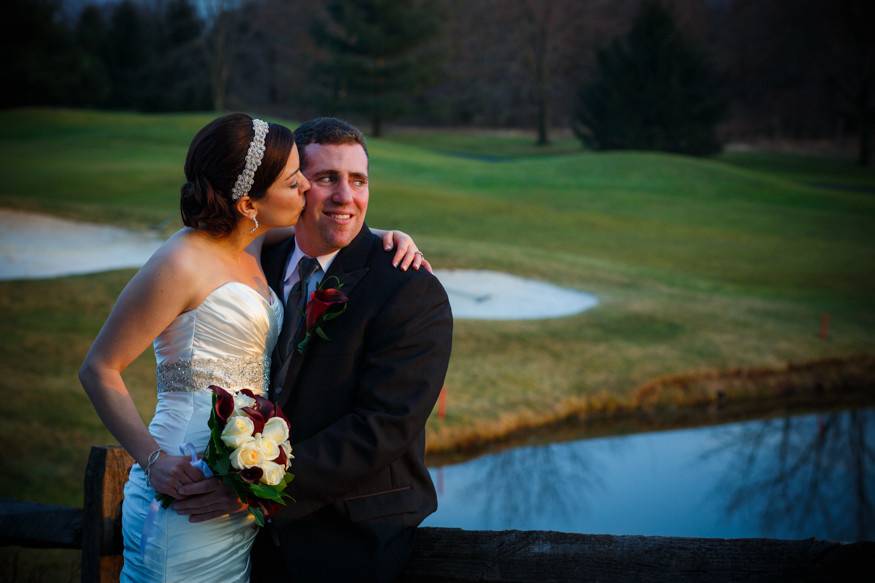 Bride kissing her groom