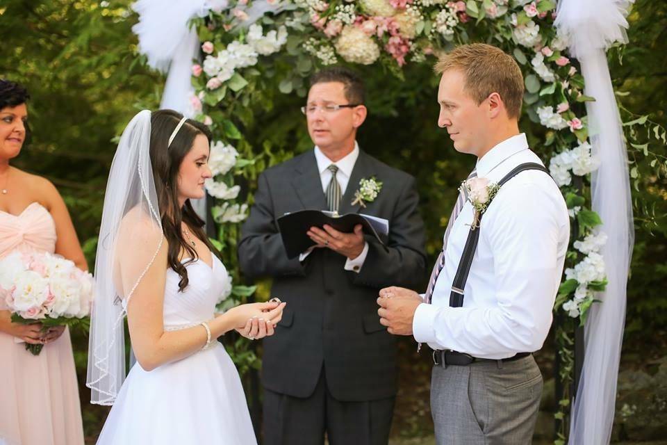 Couple exchanging rings