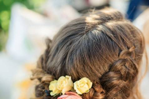 Braided updo with flowers