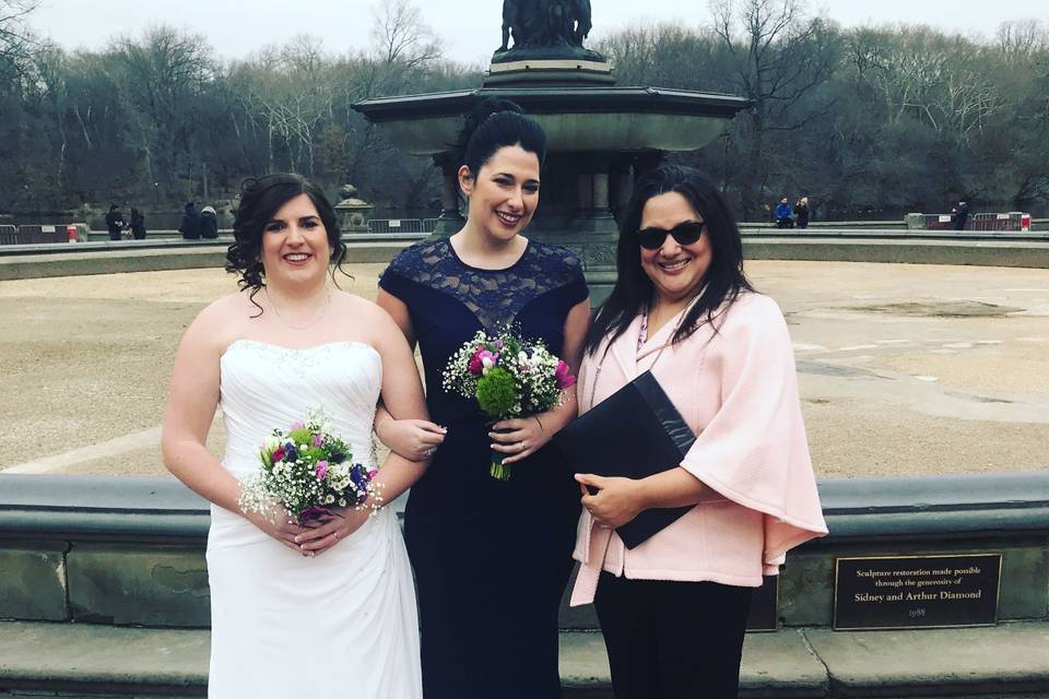 Officiant with the lovely brides