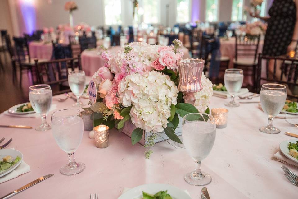 Place settings and floral centerpiece