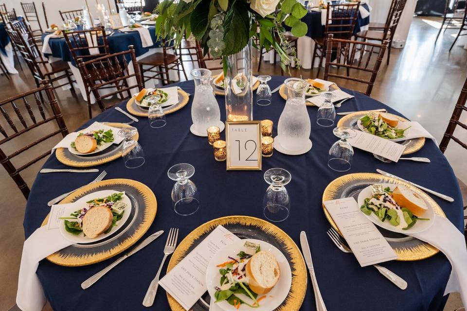 Place settings and floral centerpiece