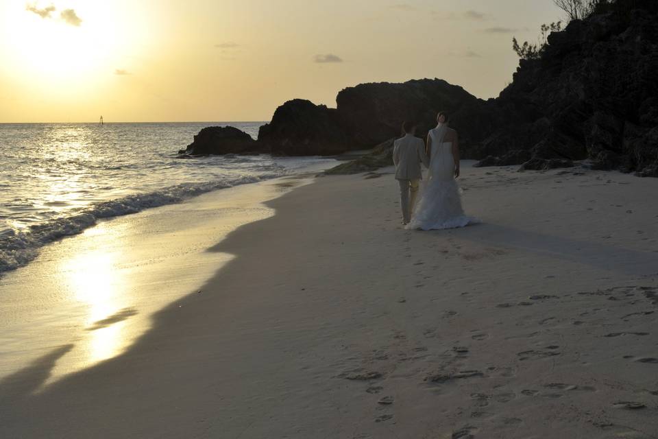 Newlyweds with cruise ship backdrop