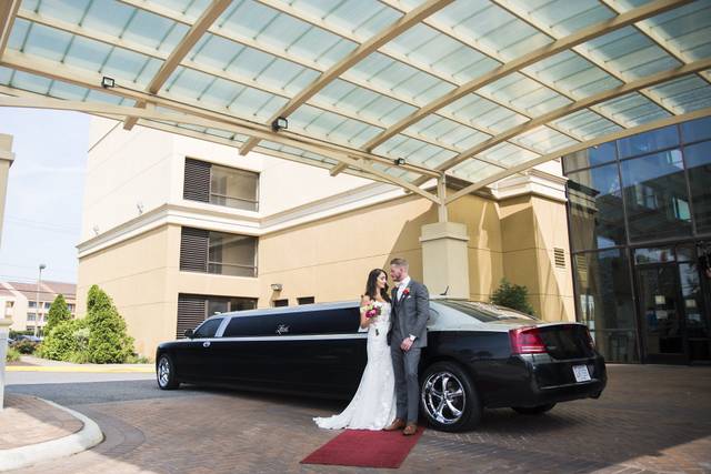 Couple by the limo
