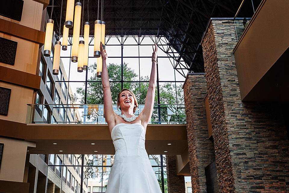 Bride with her hands up | Photography: Dragon Photo Studio http://dragonphotostudio.com/