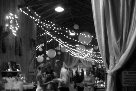The reception in the barn...the mood was festive and romantic with lights and paper lanterns.