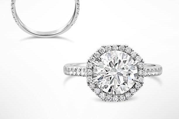 One of our recent custom designs in this diamond engagement ring with hexagonal halo