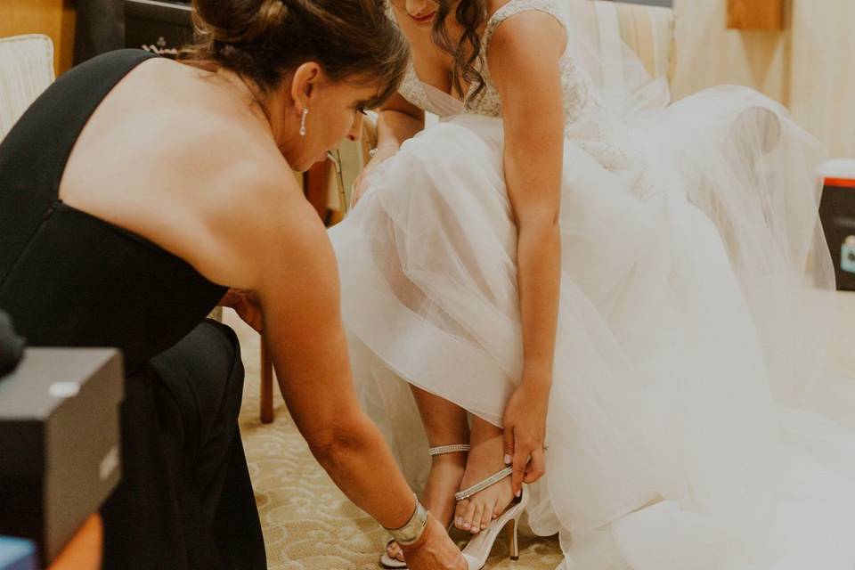 Bride and mom getting ready