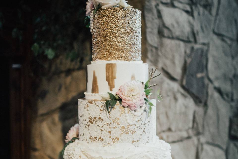 White and gold wedding cake