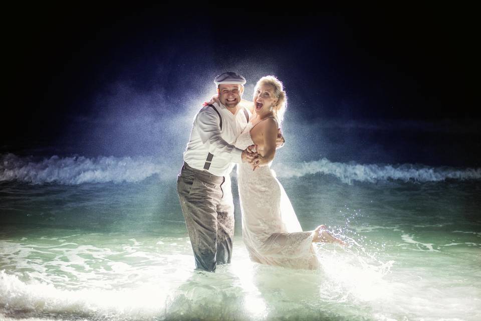 Couple glowing in water