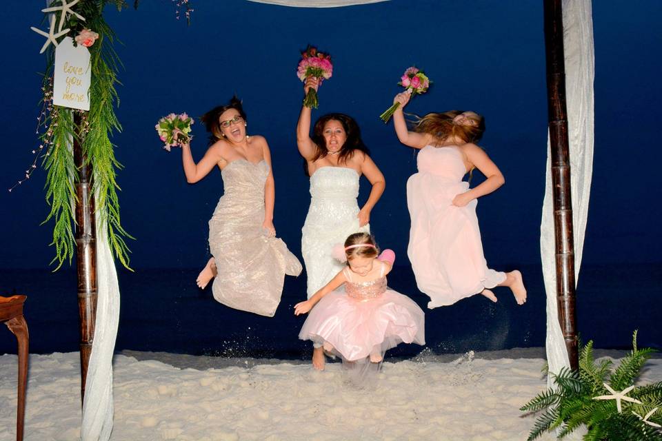 Bride and her guests take a jump shot