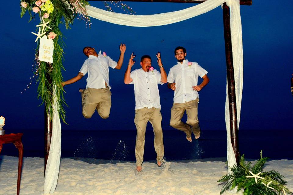 Jump shot of the groom and his groomsmen