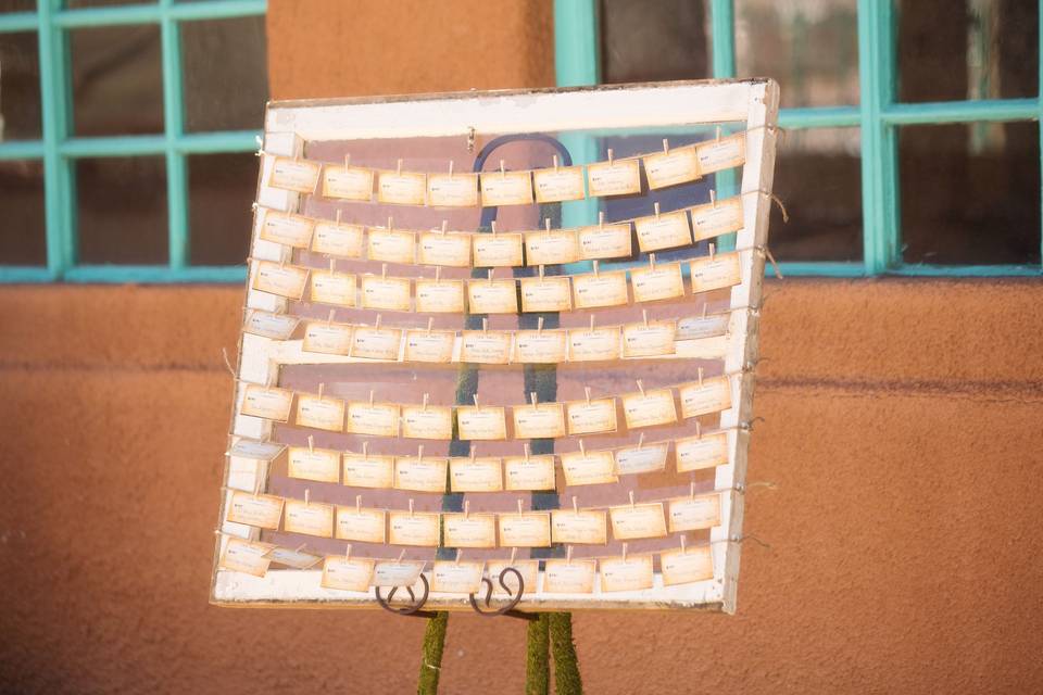 The bride had a number of old windows. We used this one for the escort cards.