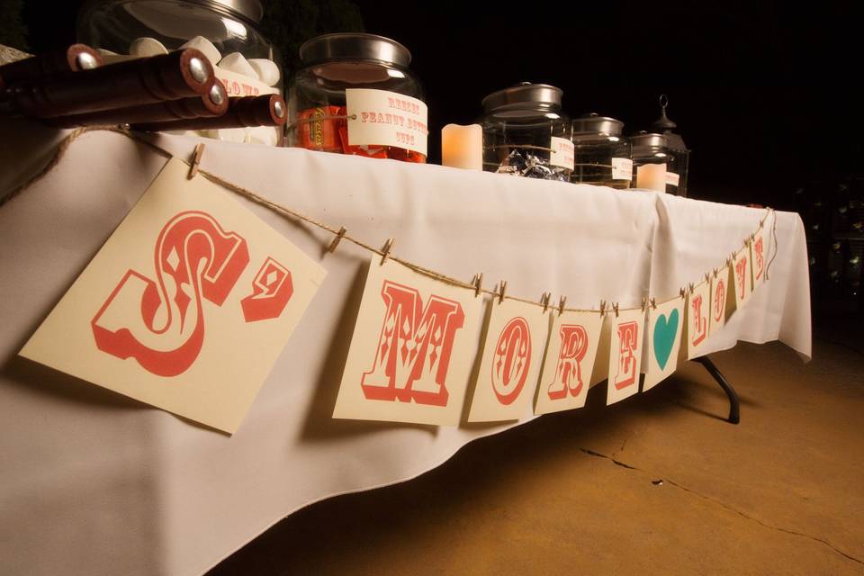 The couple had a smore's bar set up for their guests to enjoy and sit out by the fire.