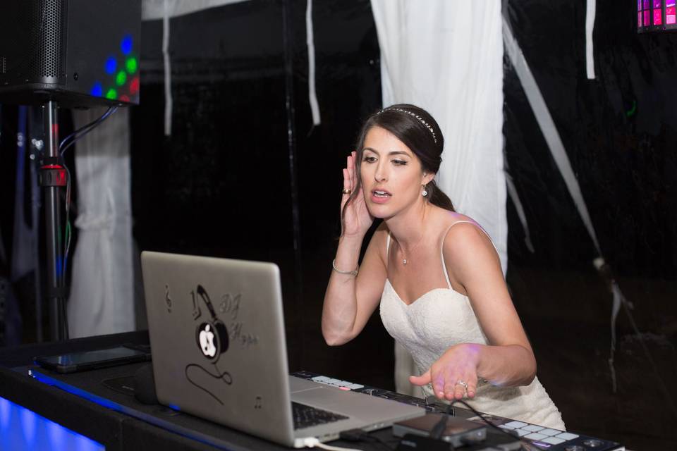 The bride on the DJ booth