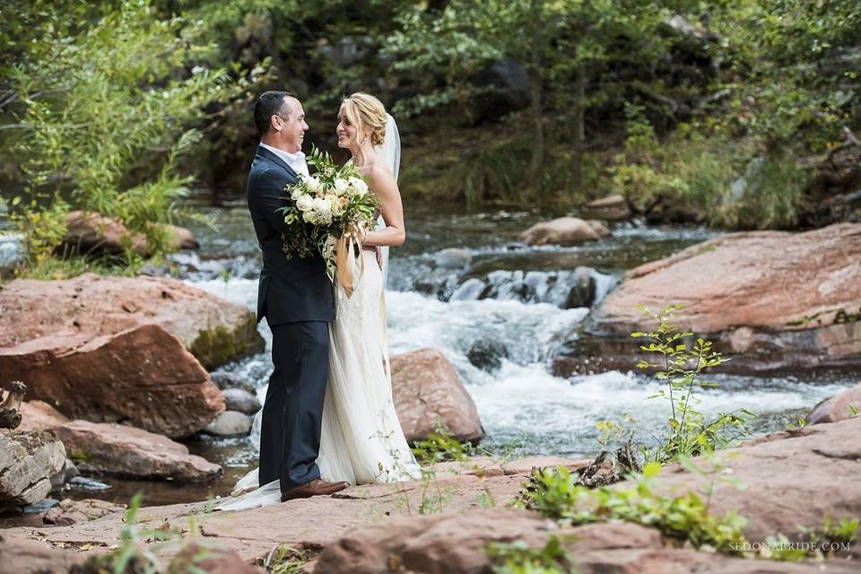 Newly weds at Serenity Point at L'Auberge de Sedona. Photos by Sedona Bride Photographers