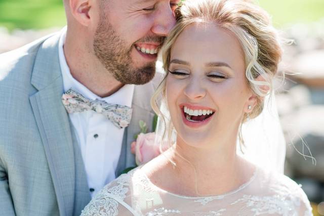 Bride laughing at groom